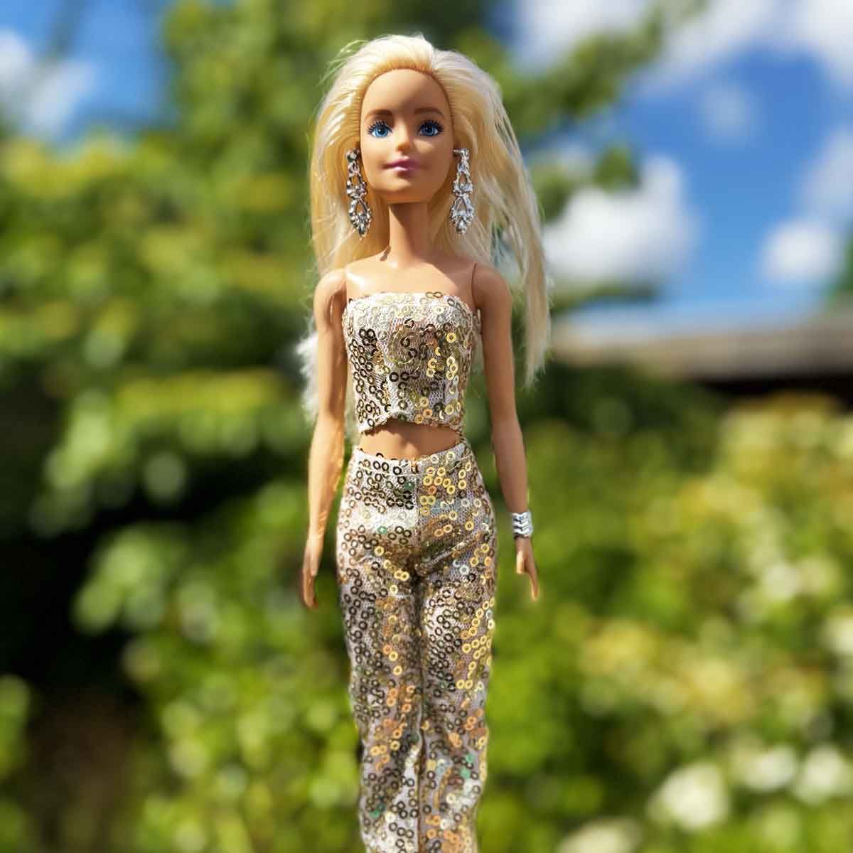 Barbie outfit goud met strapless top en broek met pailletjes