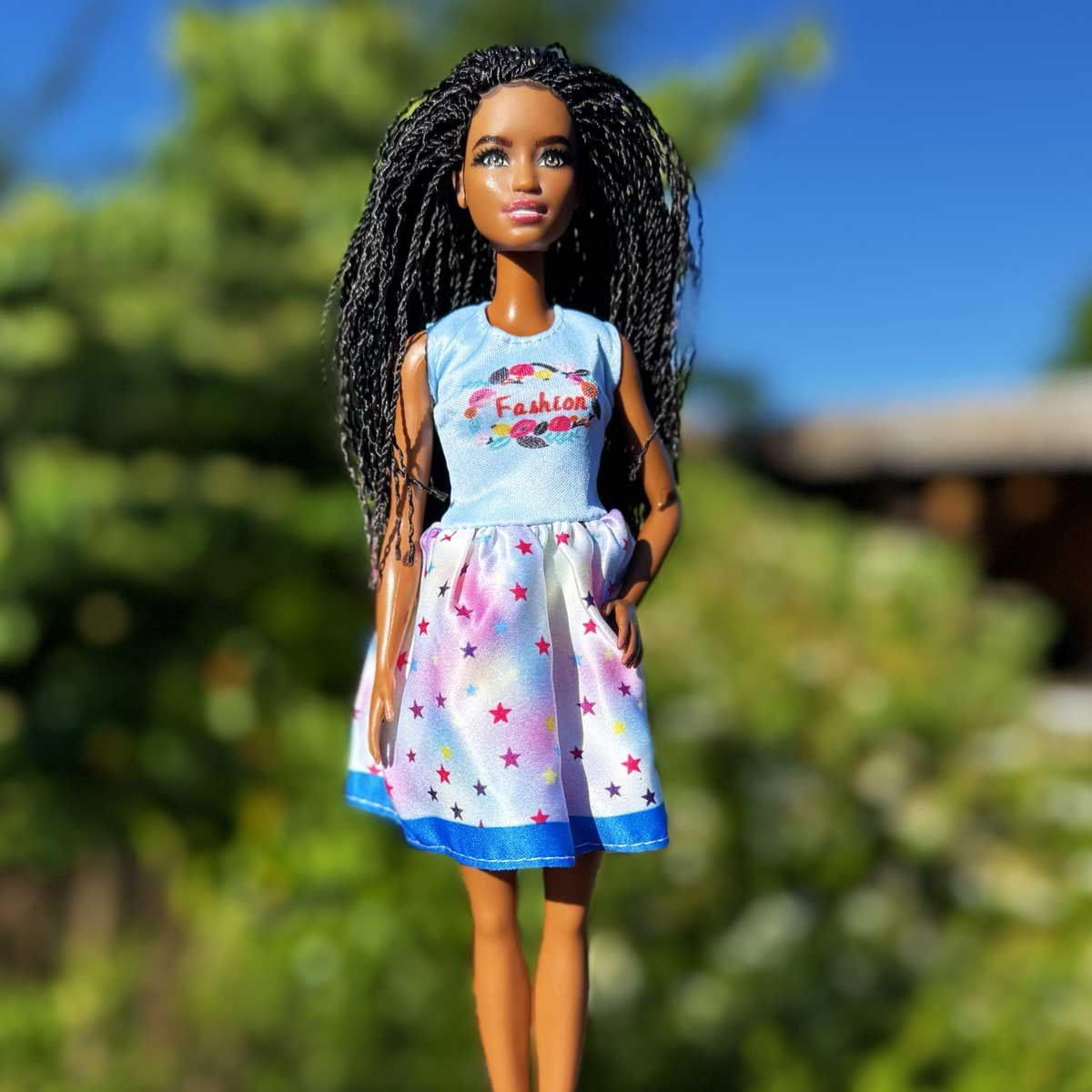 Barbie jurk ‘Fashion’ lichtblauw met gekleurde sterren