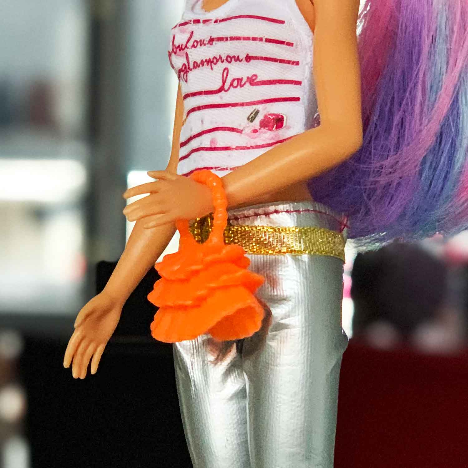 Barbie handtas neon oranje met laagjesmotief en rond handvat