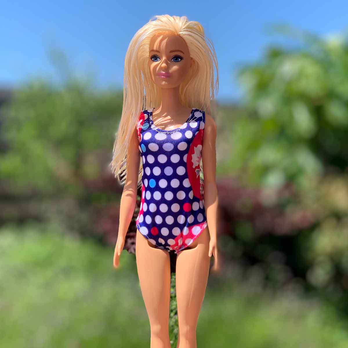 Barbie badpak blauw met witte rondjes en rode zijkant