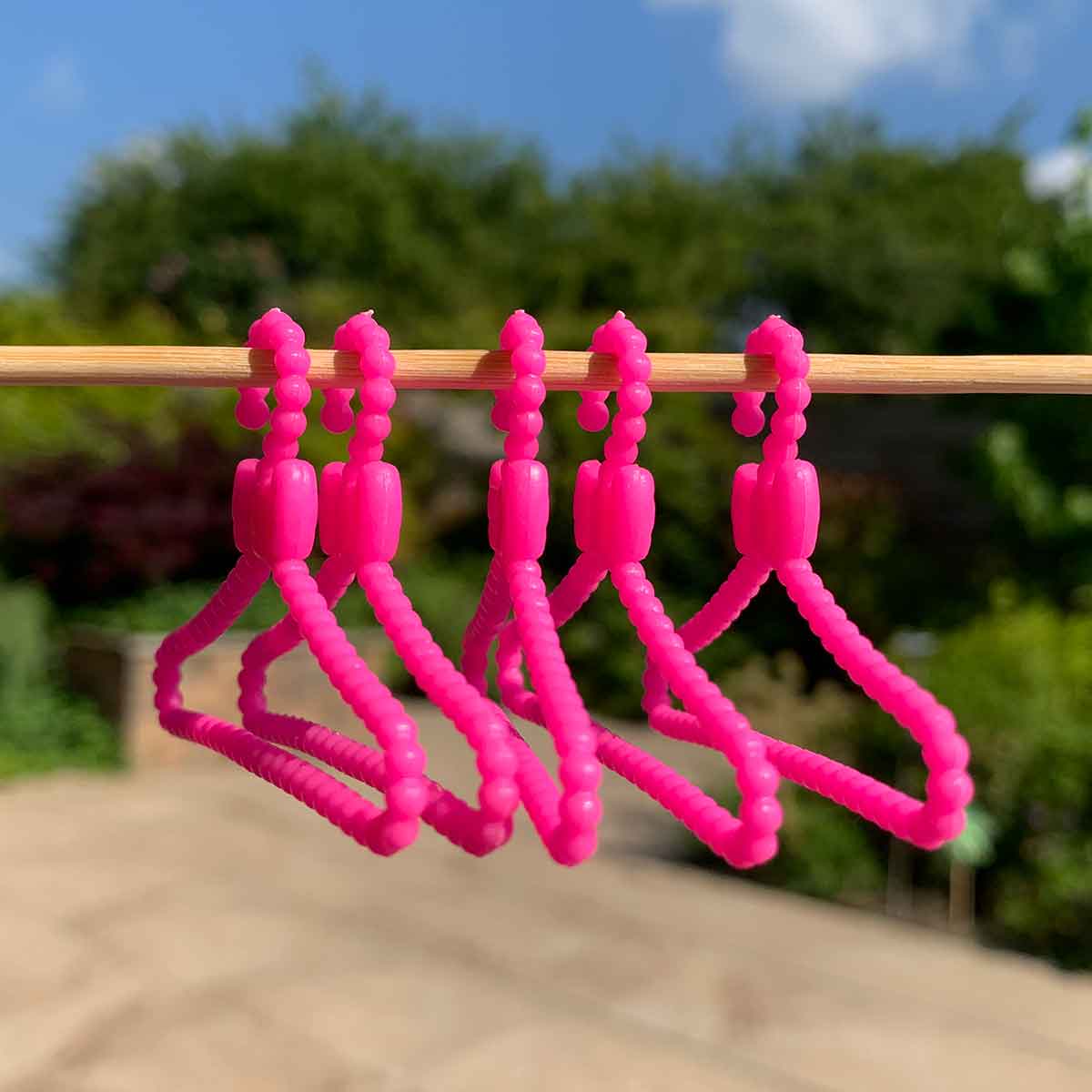 Barbie kledinghangers roze met strik (set van 5)