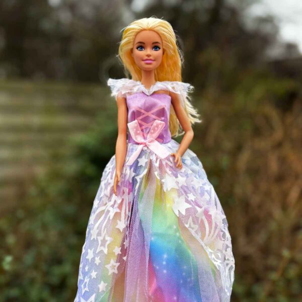 Barbie prinsessenjurk regenboog met witte sterren en strik